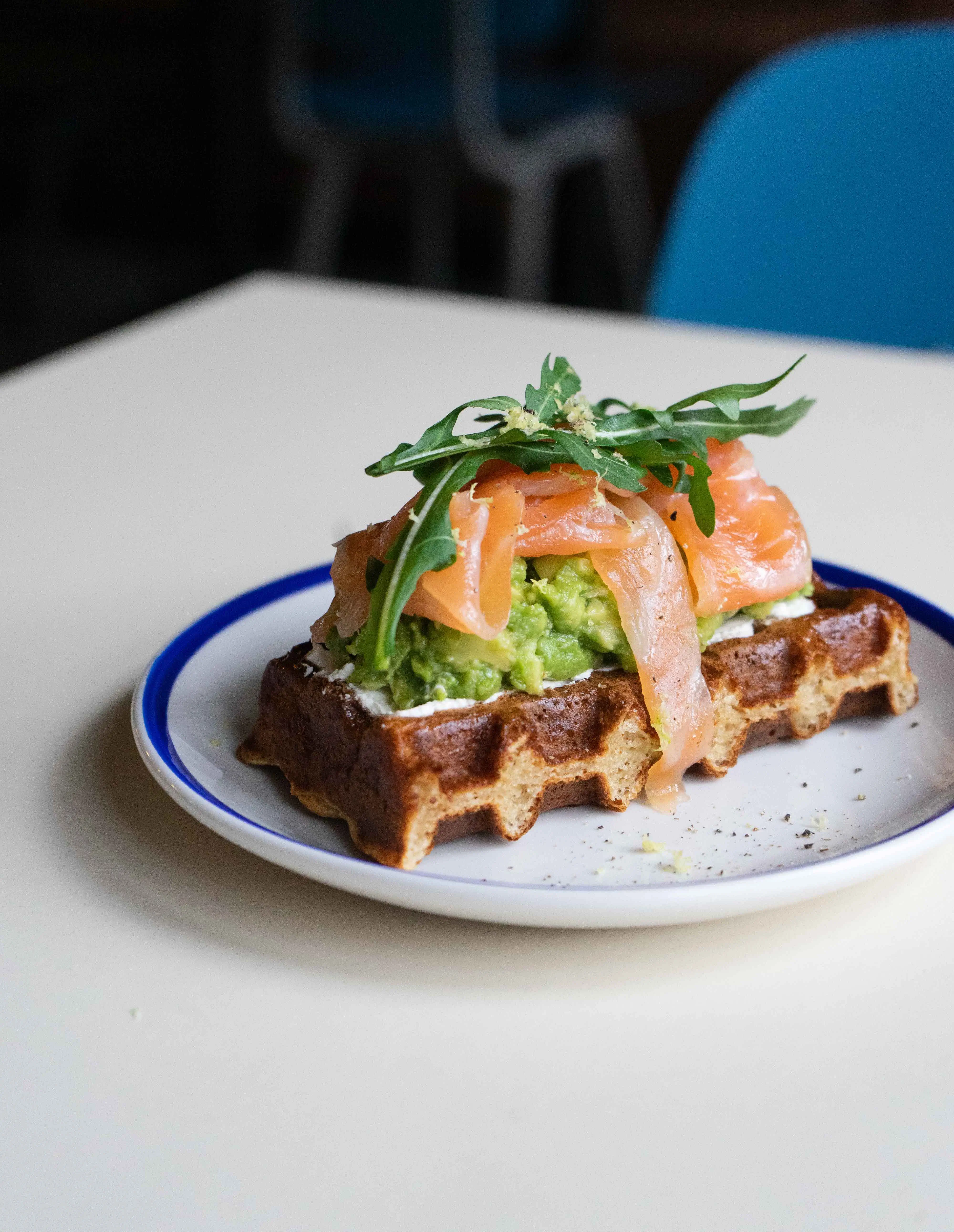 Salmon waffle with rucola